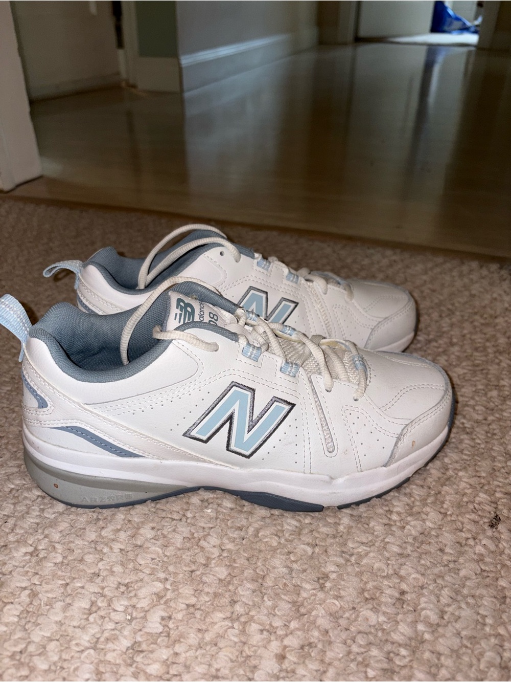New Balance 608 White Sneakers with Light Blue Trim